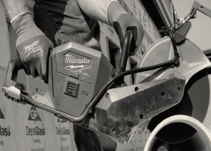 man using milwaukee m18 cut-off saw